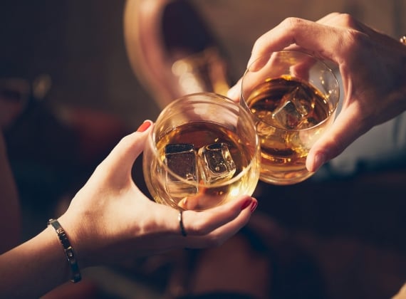 Two people cheersing